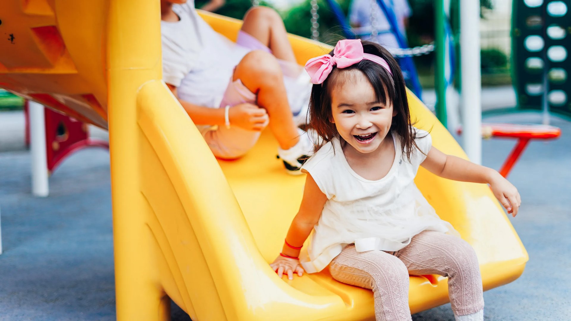 Toddler on slide (Playground in Songhill)