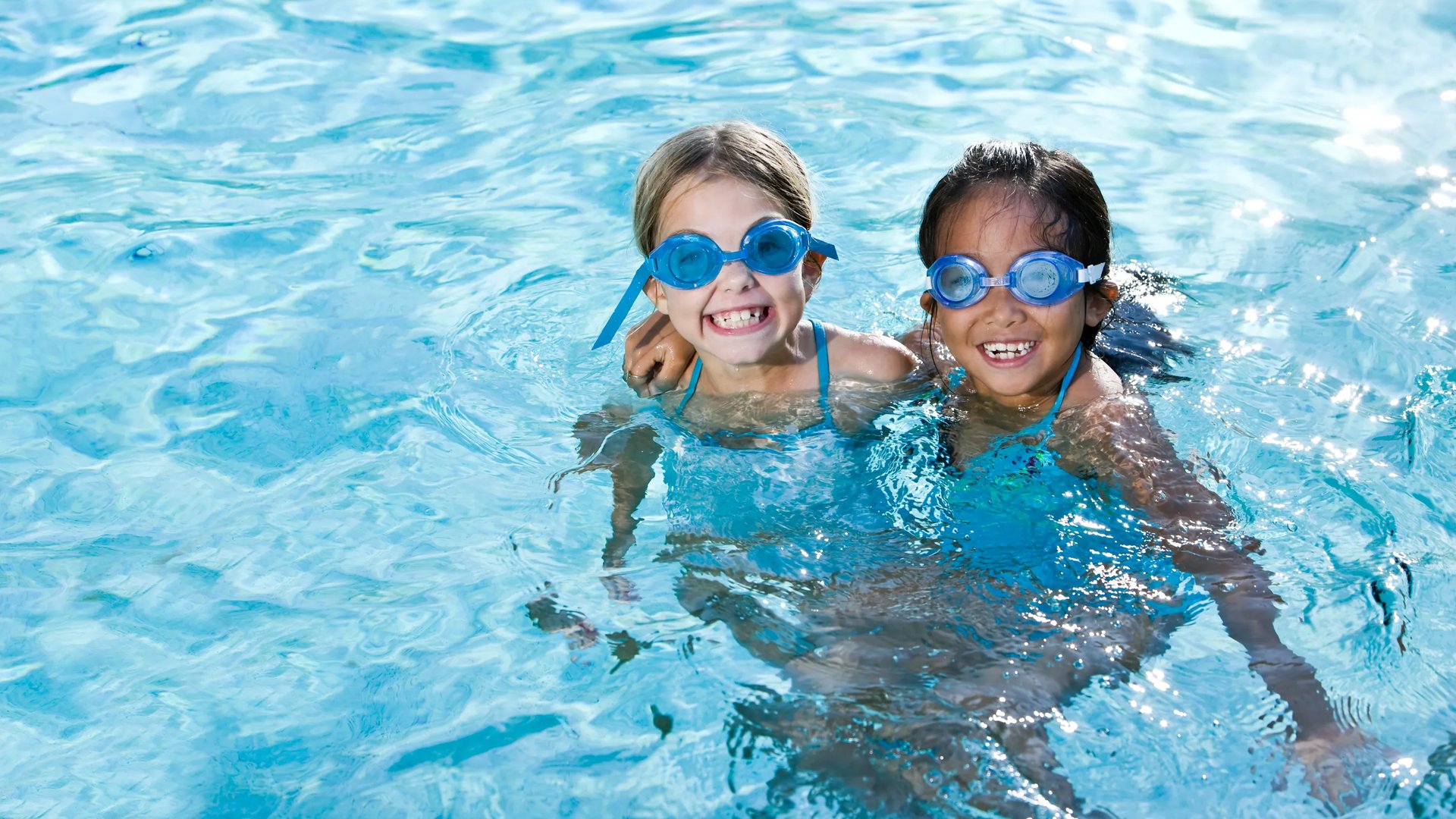 Swimming pool with smiling kids (Swimming Pool in The Reserve at The Retreat)
