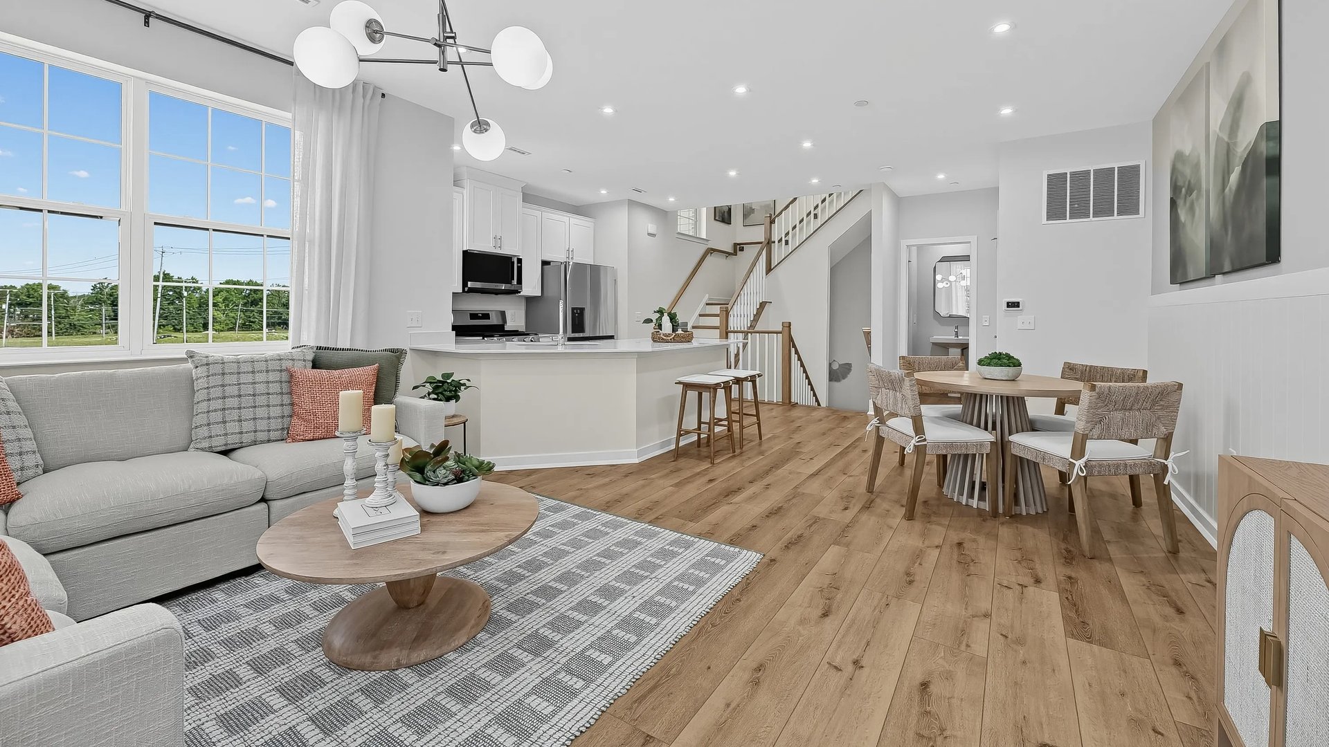 Living room near kitchen and dining area